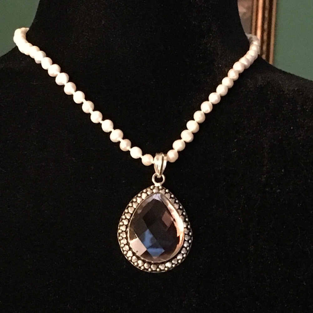 Sterling silver sage amethyst pendant on fresh water pearl necklace.